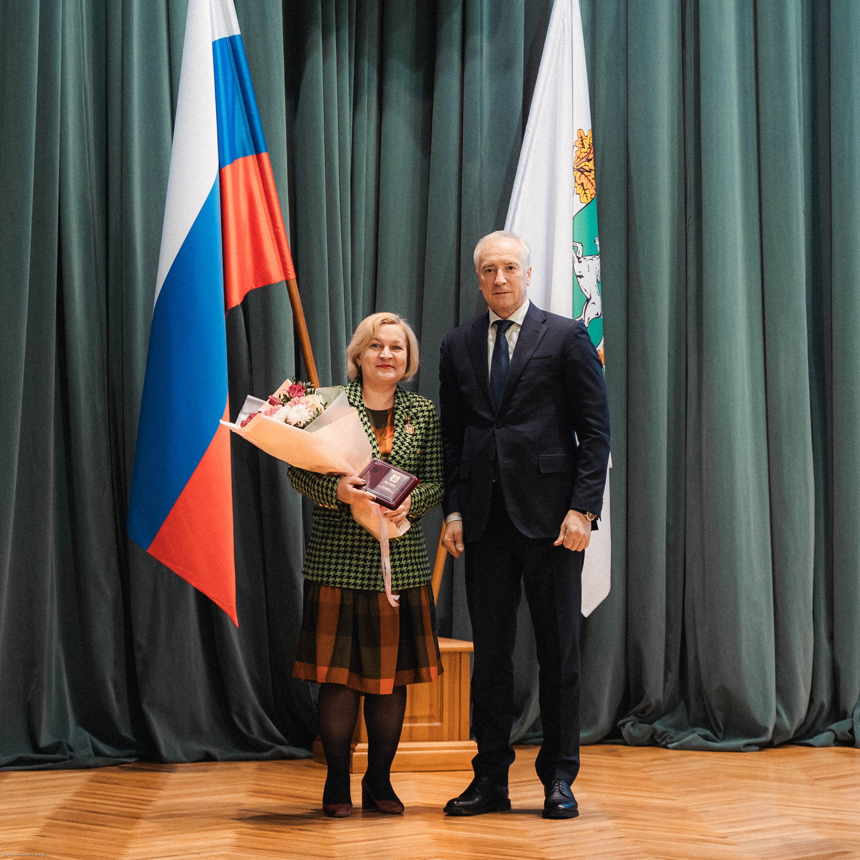 Титова